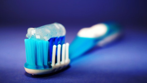 toothbrush with gel toothpaste on top